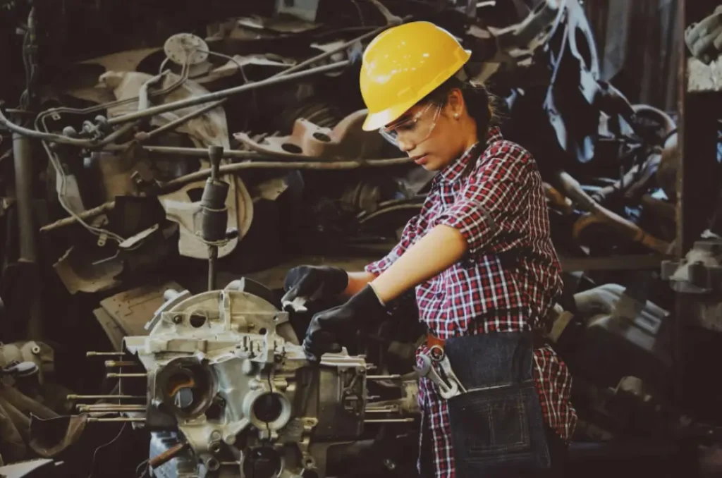 Woman working with metal