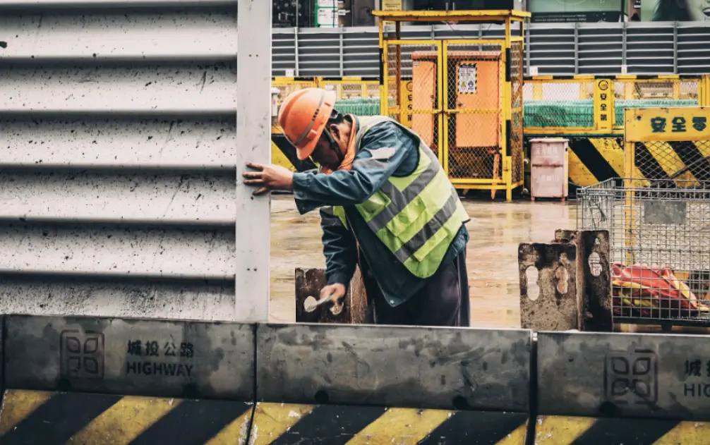 Blue-collar worker on duty at production site