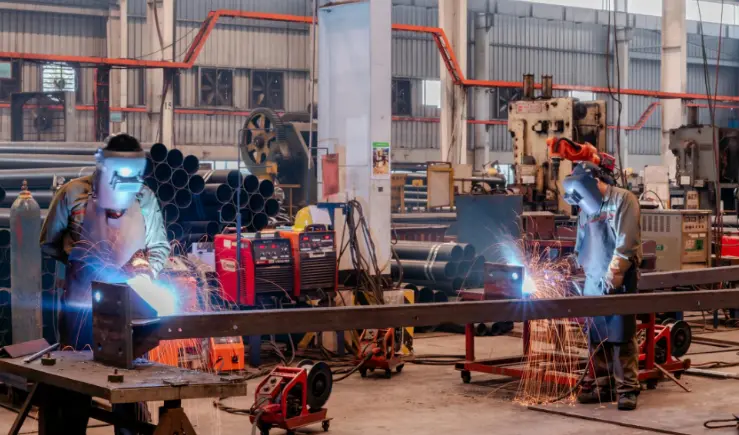 two welders working
