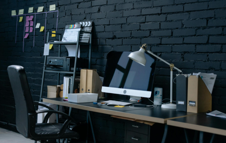 Recruiter "workbench" with laptop and phone