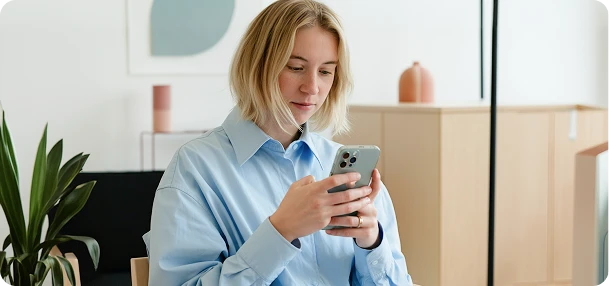 girl working on her iphone